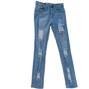 Denim jeans with holes